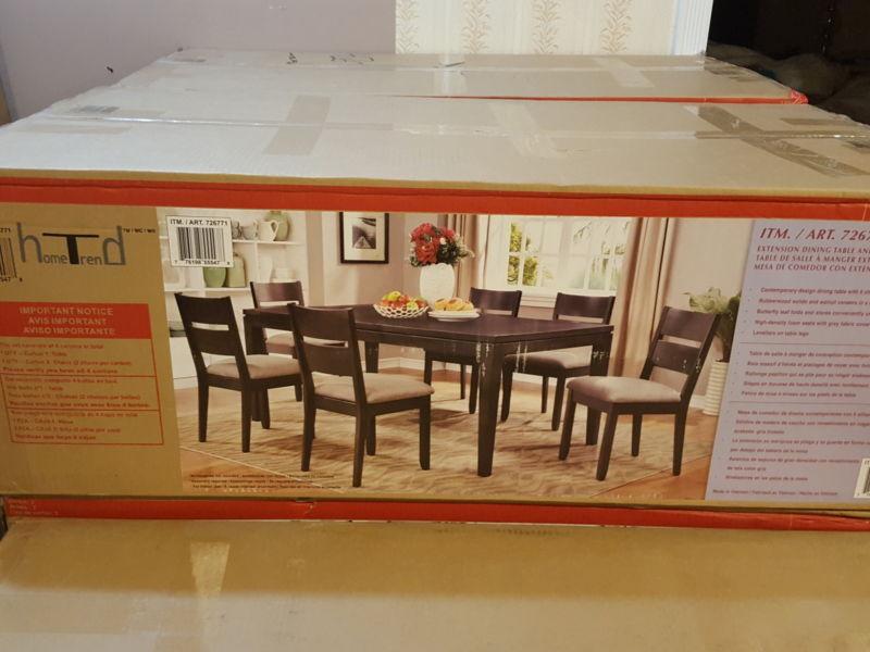 Brand new dining table and six chairs