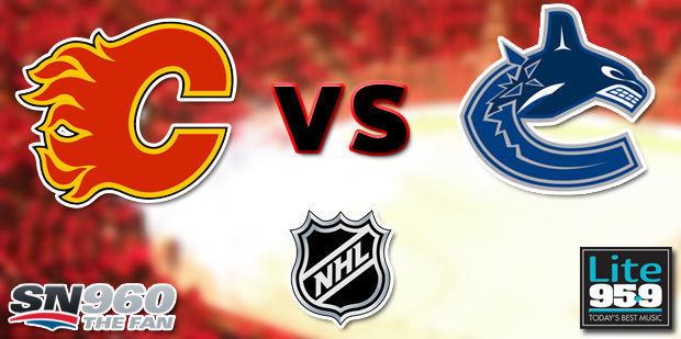 2 tickets Flames vs Vancouver Canucks Fri Dec 23 Sec 207 row 18