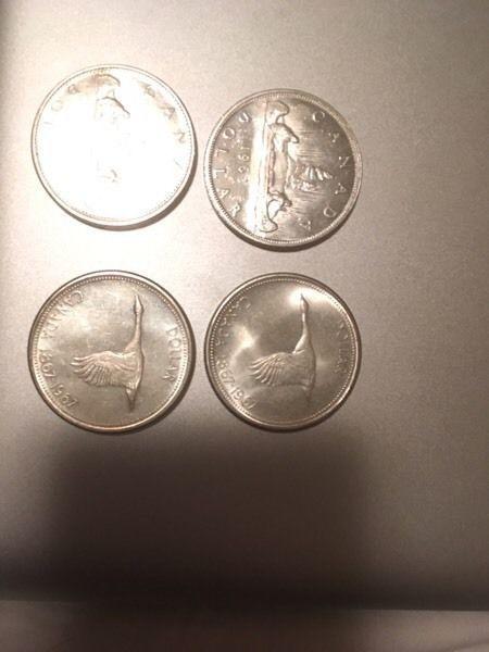 Pre 1967 Canadian silver dollars 16$ a piece