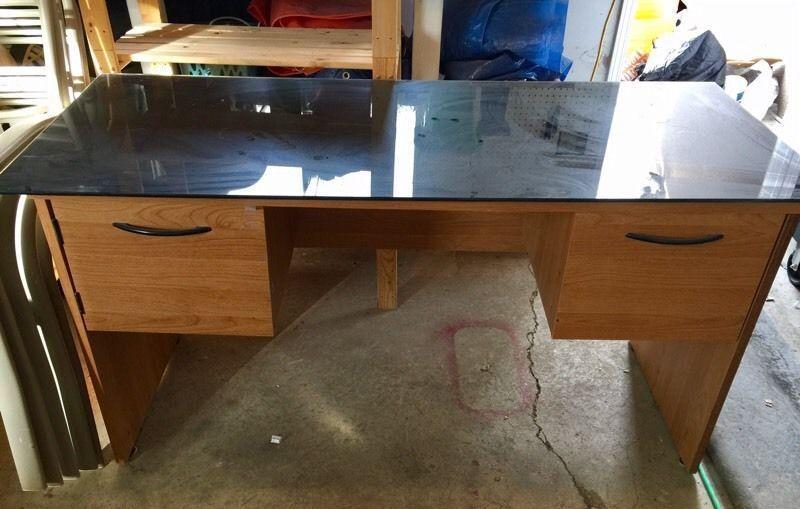 Desk with glass on top
