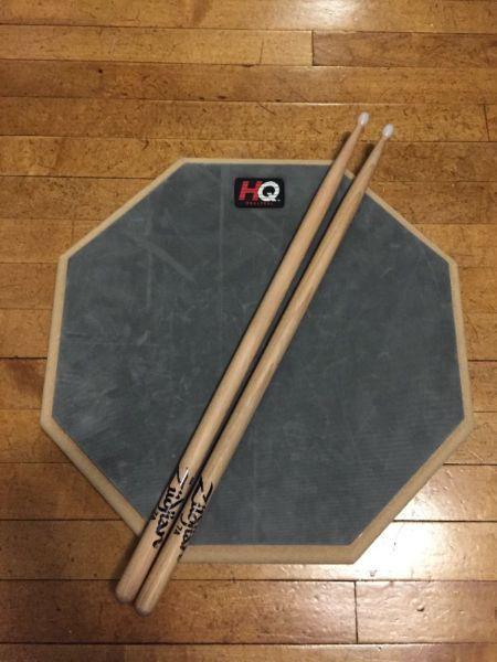 HQ Real Feel practice pad and drumsticks