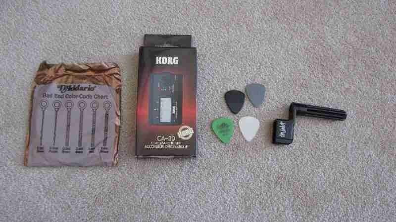 Korg Guitar Tuner, Stand, Picks, String Winder and Levy's Strap