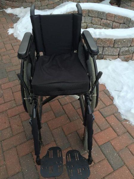 Custom Made Wheel Chair: Quickie 2