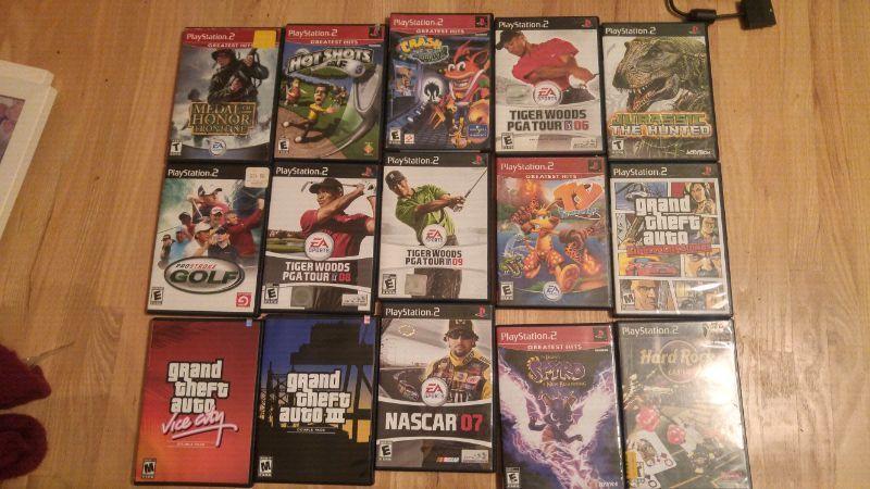 2 Ps2 systems with games